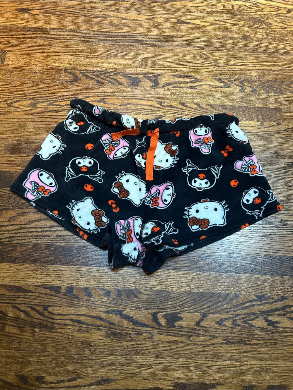 Hello Kitty Black Fleece Lounge Shorts with Pink & Orange Accents